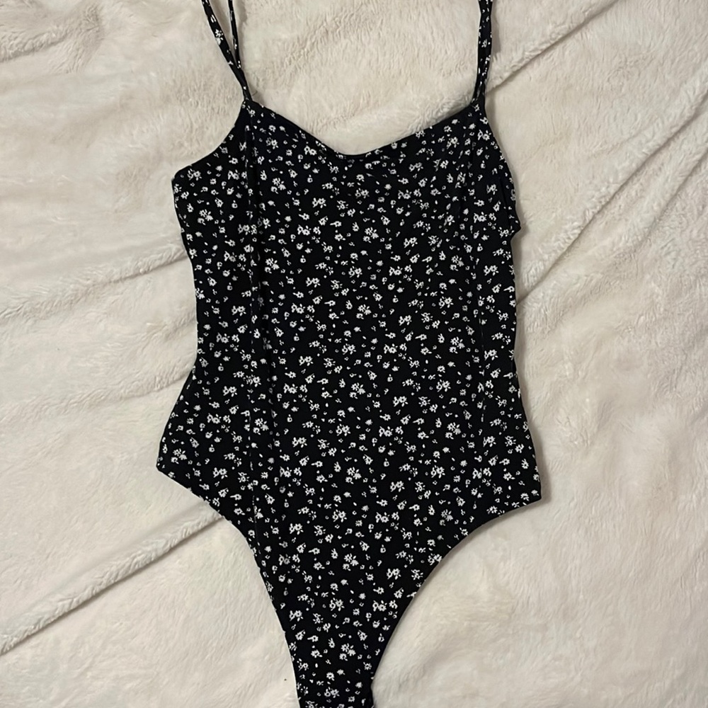 Black with white flower Thong body suit!